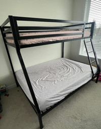 Two over full bunk bed including mattress and water proof sheets