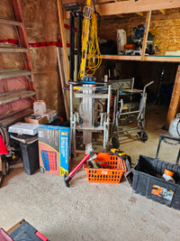 Massive tool and garage sale " inside garage on property"
