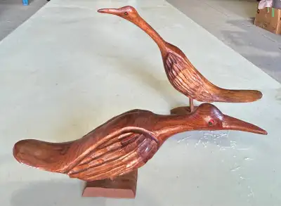 For sale is a lovely pair of wood carved “sandpiper” bird sculptures. Approximate height measurement...