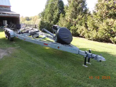 2003 Custom made Mel boat trailer - 1800 pound rating - triple axle with bunks and rollers - electri...