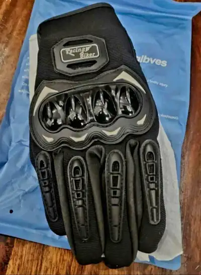Brand new motorcycle gloves available in red,blue and black . Available in all sizes EACH $25