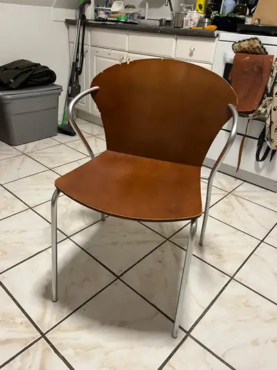 Four chrome and wood style kitchen chairs, View more