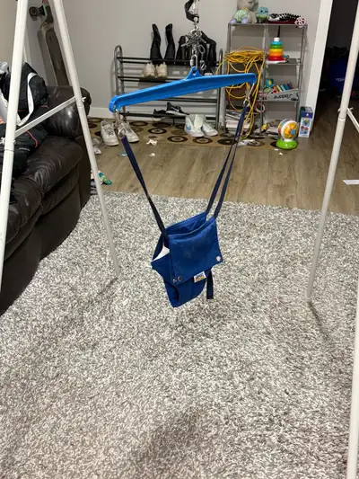 This Jolly Jumper with stand is perfect for your little one to bounce and play! It's in used conditi...