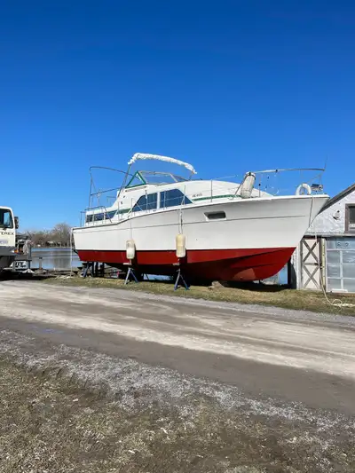 36 foot boat currently used as cottage liver board has no engines. You can text me at 613-661-7998.