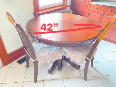 Round Kitchen table 42inch with 4 chairs, good condition., View more