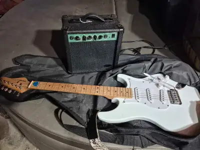 electric guitar and amp, View more