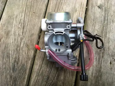 Arctic cat carb. Not sure what model 300-500cc? New. Elec choke