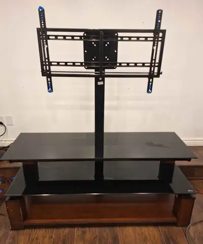 TV stand with VESA mount, great condition. Pick-up only - can help move/load it, but it needs to go...