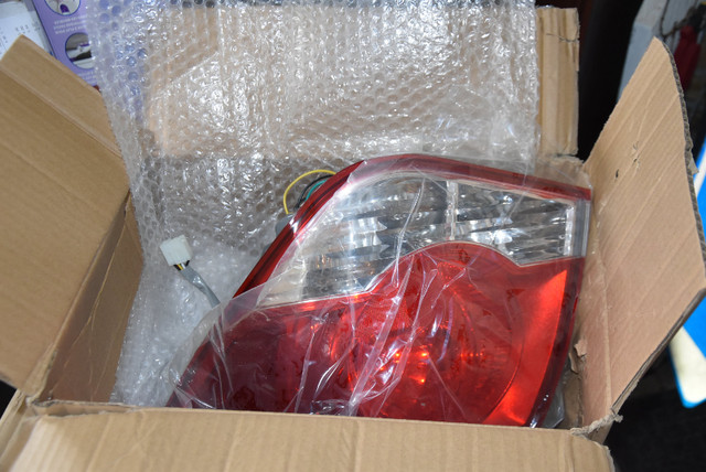 NEW 2015 Chevy Cruze RH Tail Light in Auto Body Parts in Kitchener / Waterloo