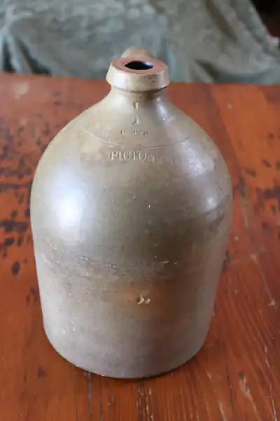 Hi. I have an old crockery jug. 1 IMP, Picton, C.W. for sale. The jug shows some wear and marks thro...