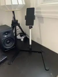 Articulating phone stand