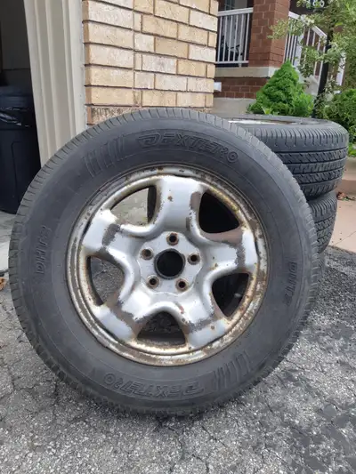 4 used tires (with Rims) for sale. DEXTERO DHT2 P215/70R16. Good condition. Asking for $200.