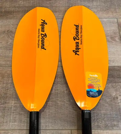 Two unused kayak paddles for sale. Aqua Bound Manta Ray fibreglass paddle, 2-piece, 240cm long, adju...
