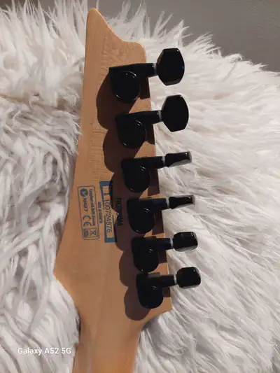 This is an Ibanez 350M electric guitar, known for its fast neck and versatile sound, perfect for shr...