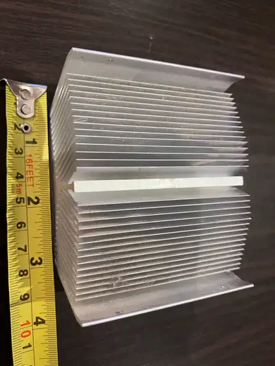 Aluminum heat sink with large surface for good contact and heat transfer. Large deep fins to help di...