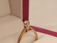 Yellow gold diamond ring.14K. size 6.....