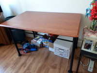 Brown Table with black legs