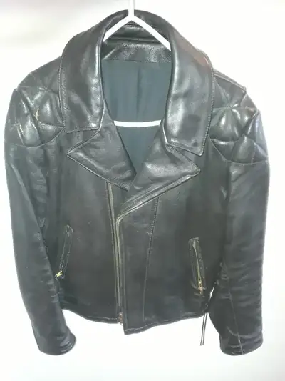 1 Men's Leather size 44 made at Custom Leathers in Edmonton. Good condition. All zippers function we...