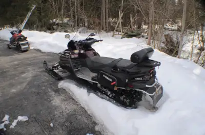Great running 4 stroke snowmobile. Low km (4266). electric start, reverse, heated grips (front and r...