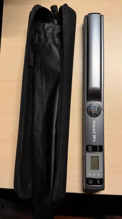 Working Skypix document colour scanner. Has wifi transfer capabilities. Was used for finance for sca...