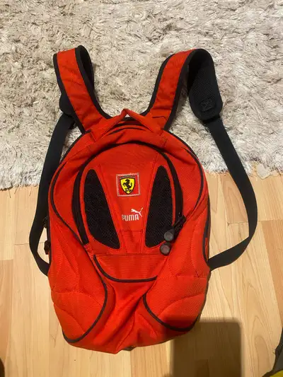 Check out this cool, used PUMA Scuderia Ferrari red sportswear backpack, perfect for any Ferrari or...