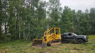 Caterpillar 931C LGP trackloader available for hire with operator in the Edmonton and Drayton Valley...