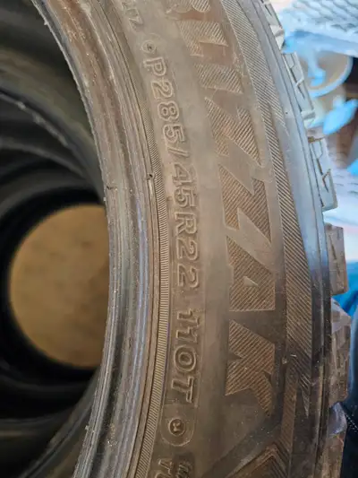 Near new 285/45R22 Bridgestone Blizzaks for sale. Switched trucks. they are in fairly new condition....