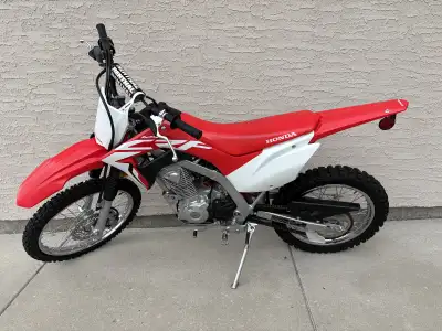 2021 Honda CRF125 big wheel, like new, electric start, fuel injected, has less than 15 hours on it,...