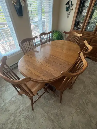 Solid Oak table and chairs, View more