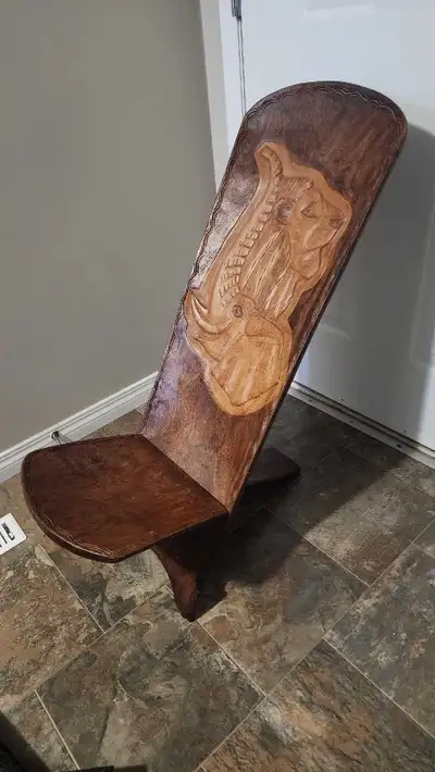 Hand carved wood chair, (lion/elephant carving), View more