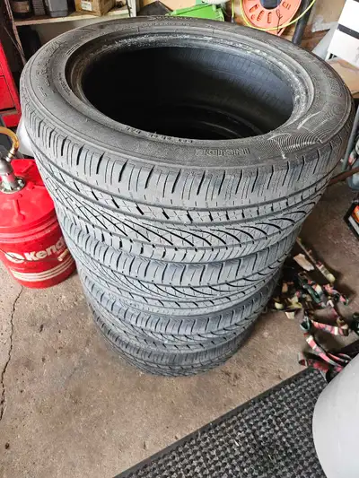 Perfect condition, low km. Great tread with even wear. No plugs or patches. Set of 4, 205/55/16 Brid...