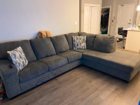 Newer grey sectional in good condition. Not even 1 year old.