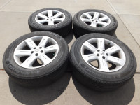 4 18 inch Alloy Rims for Nissan (5X114.3 mm).  Tires are no Good