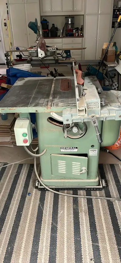 This heavy-duty General table saw, equipped with a precise Delta Unifence system, is a reliable work...
