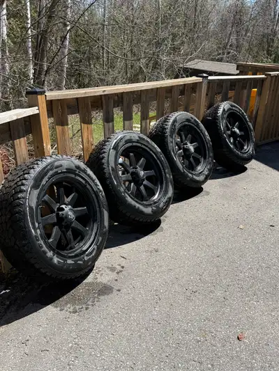Winter Tires on Rims like new only used for one winter, 20” rim and tire c/w black security nuts and...