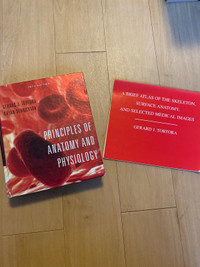 Principles of Anatomy & Physiology textbook + extra reference 