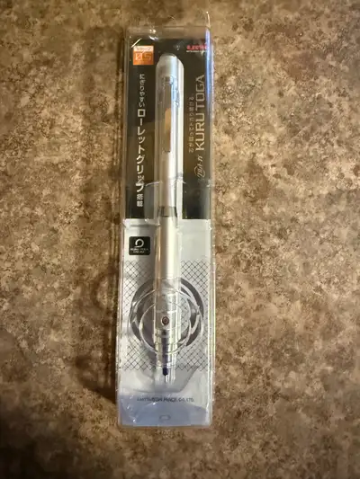 I'm selling a new Mitsubishi Uni Kuru Toga Roulette Grip 0.5 mm mechanical pencil, still sealed in i...