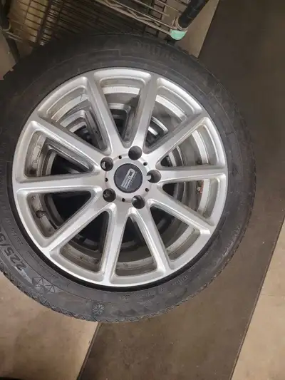 Offering a set of four used 225/50R17 Continental Viking Contact 7 winter tires mounted on alloy whe...