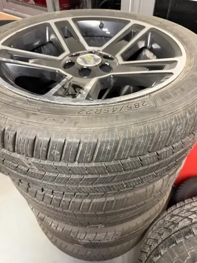 Michelin Defender all season tires on Chevy Silverado OEM aluminum rims 285 / 45R22 Set of 4 tires -...