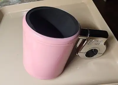 Kruzer Kaddy cup holder. Pink mounts on motorcycle handlebar. 4" high, approximately 3" diameter. Gr...