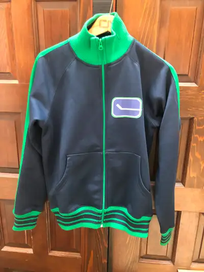 Vintage Canucks Track Jacket in great condition. Adult small., View more