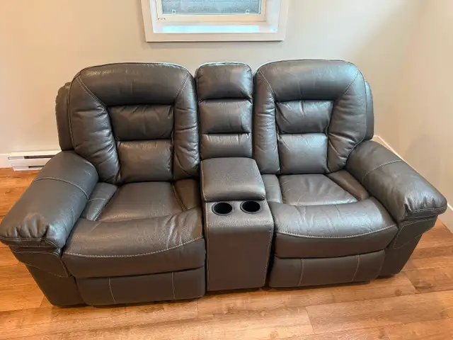 Leather reclining and rocking sofa. in Chairs & Recliners in Charlottetown - Image 4