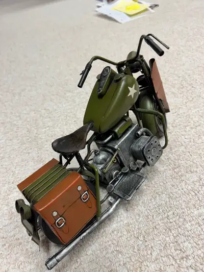 This unique Harley Davidson is made entirely of metal to replicate a vintage Harley! 13” in length &...
