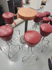 Barstool with round table and small chair
