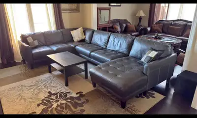 100% Leather Sectional Couch Like New dark grey can Deliver, View more