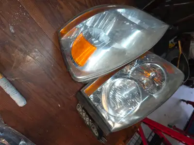 Original headlights out of a 2006 Dodge ram. Need polishing but ok shape otherwise