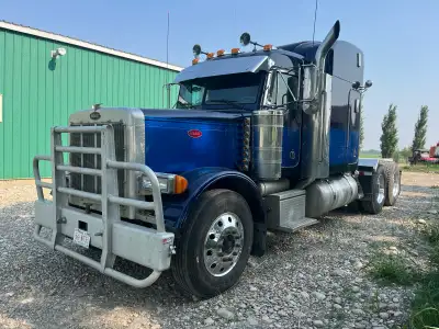 2000 379 SH Peterbilt manufactured in 07/1999 so no ELD log with 63” midrise bunk Cat C12 engine set...