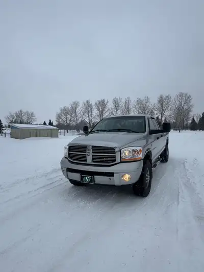 2006 Dodge Ram 3500 Laramie is a highly sought-after heavy-duty truck, featuring the reliable 5.9L C...