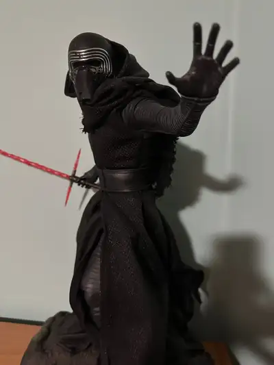 Kylo Ren also comes with a clenched right fist and lightsaber hilt for the real leather belt as an a...