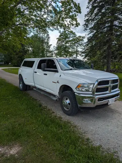 Selling 2 my company vehicles. This one is a 2014 Ram 3500 Cummins diesel and has been saftied and u...